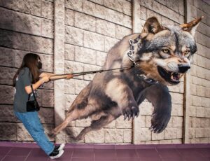 Cane al guinzaglio che tira, evidenziando un errore comune nei padroni durante le passeggiate.
